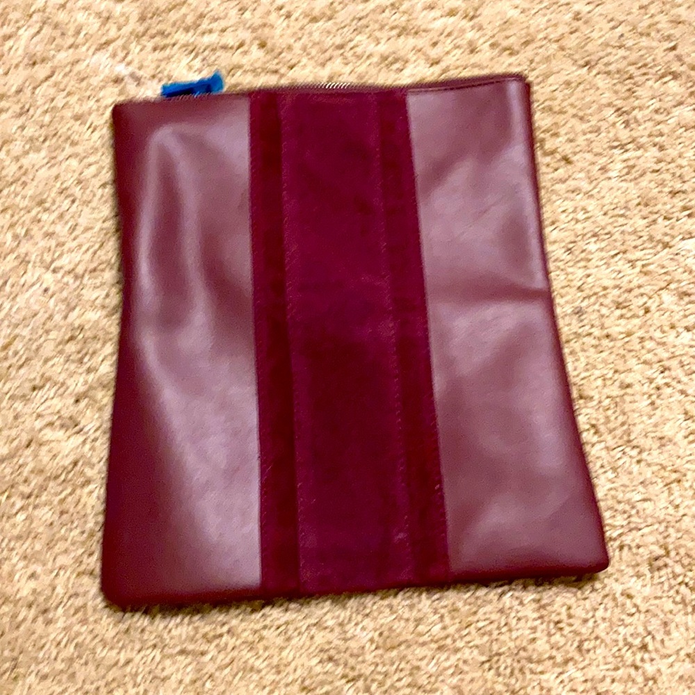 Wine colored purse/makeup bag can use for either